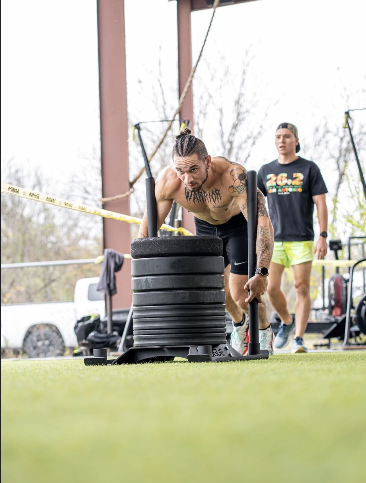 Sled push during a HYROX session